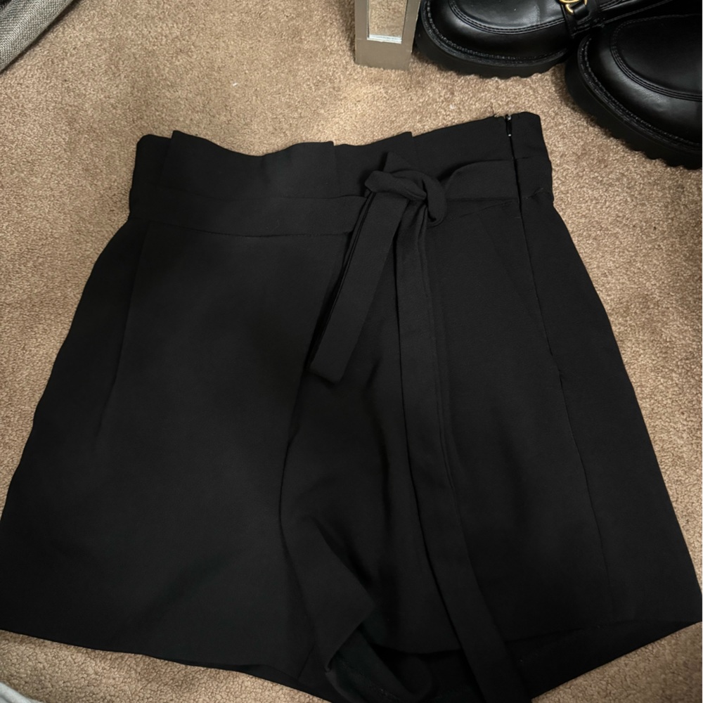 Never worn boutique black shorts with tie waist